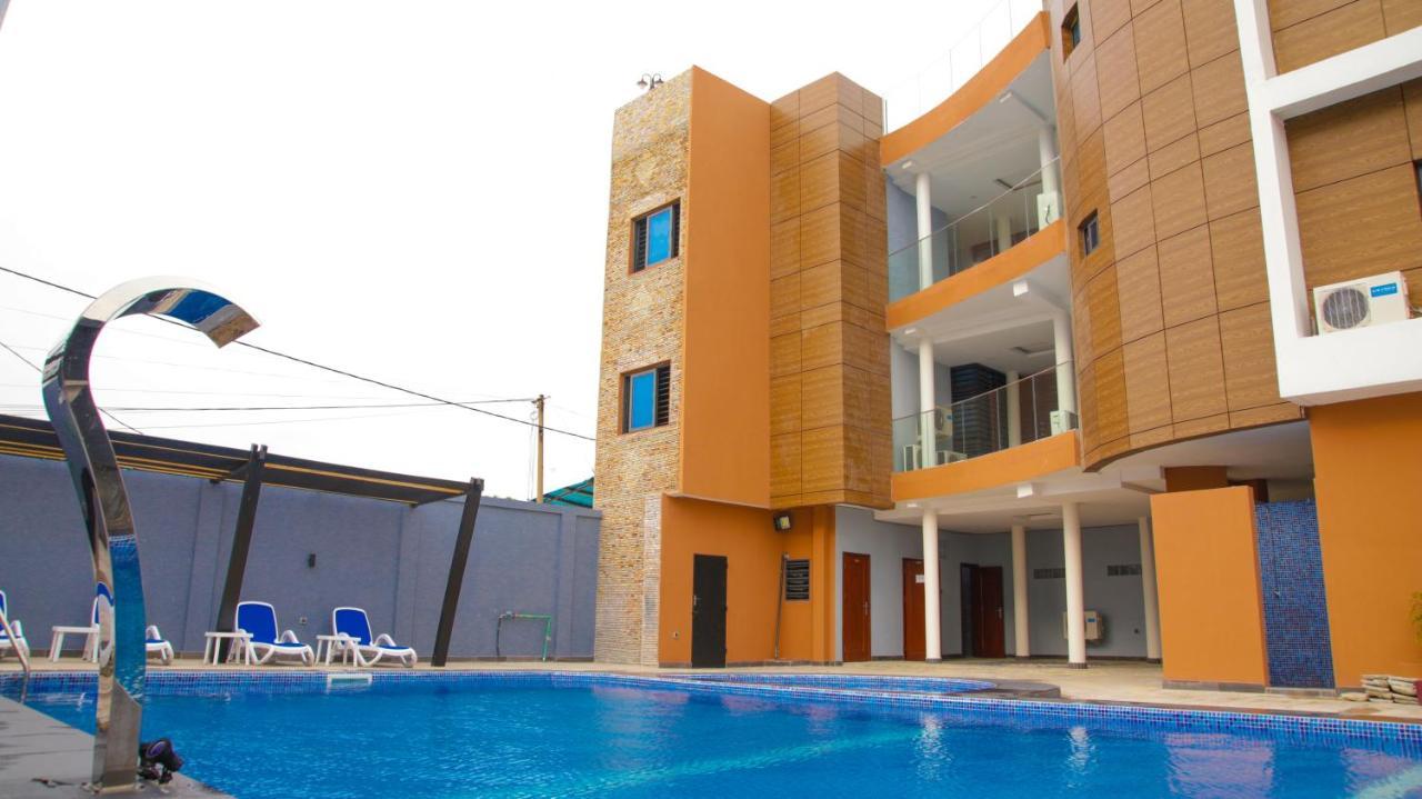 Hotel La Casa Cielo Котону Екстериор снимка