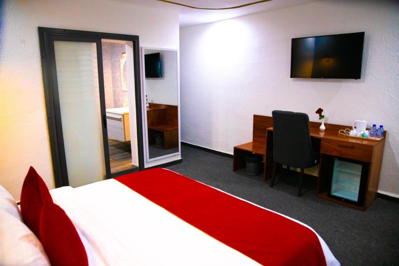 Hotel La Casa Cielo Котону Екстериор снимка