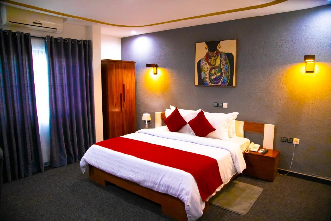 Hotel La Casa Cielo Котону Екстериор снимка